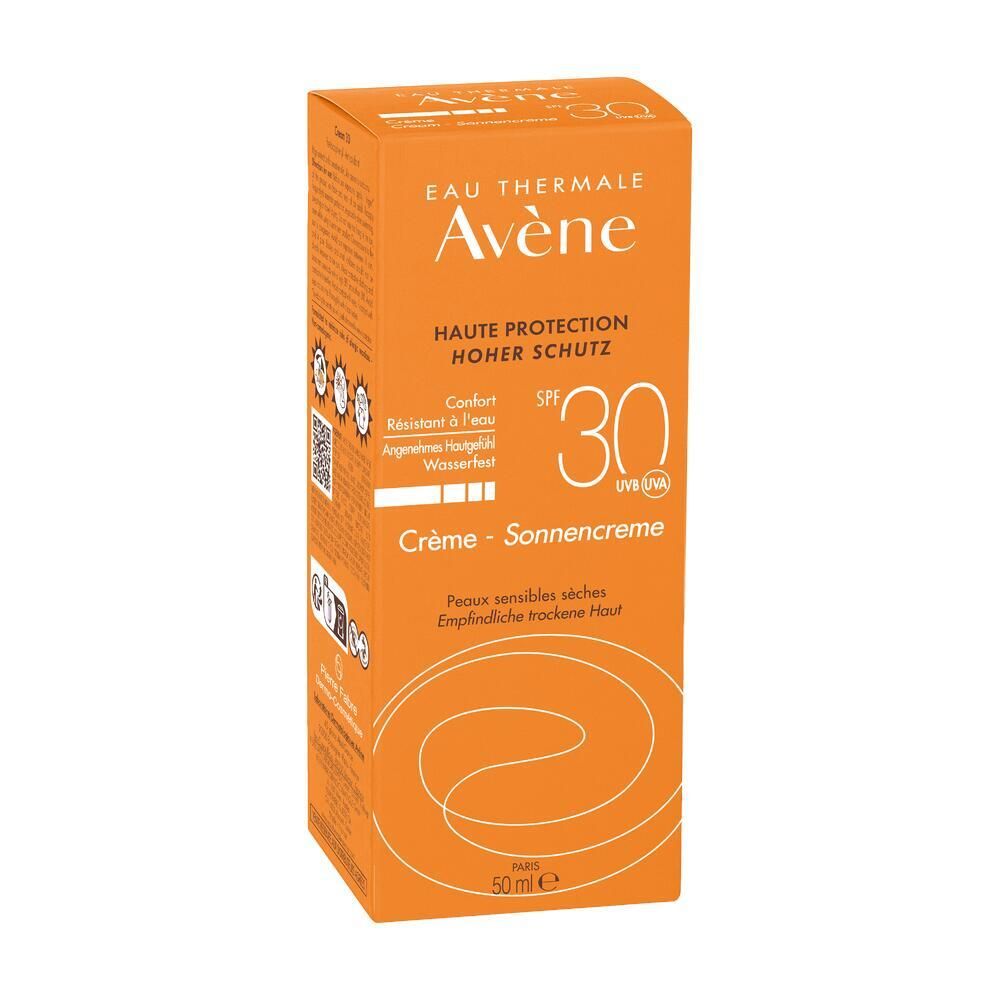 Orangefarbene Schachtel mit Sonnencreme. Marke Avene, SPF 30. Creme für trockene, empfindliche Haut. 50 ml.