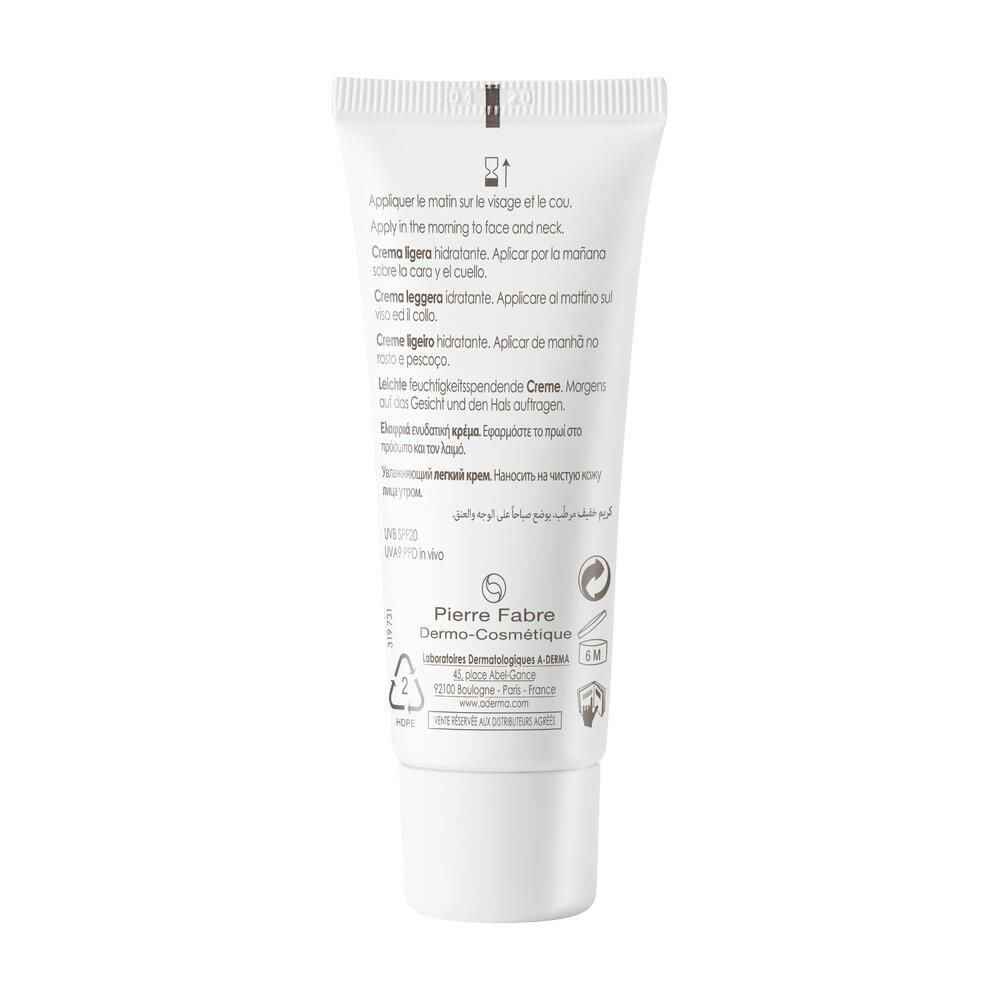 Tube de crème blanc. Texte multilingue. Logo du fabricant et symboles de recyclage.