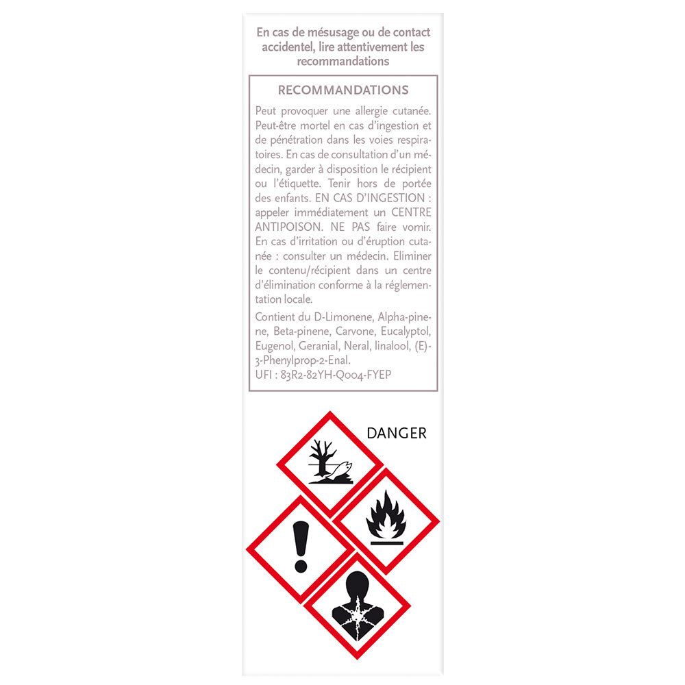 Dos de l'emballage avec avertissements et symboles de danger. Texte en français.