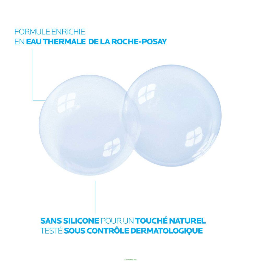 Deux bulles bleues. Texte: Formule enrichie en eau thermale de La Roche-Posay.