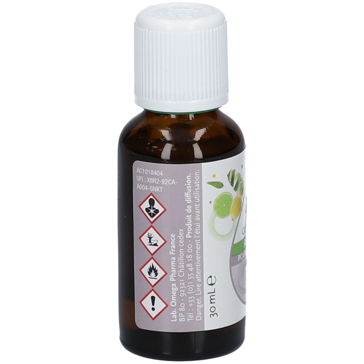 Bruine glazen fles met witte dop. Etiket met waarschuwingssymbolen, productinformatie en tekst. 30 ml.