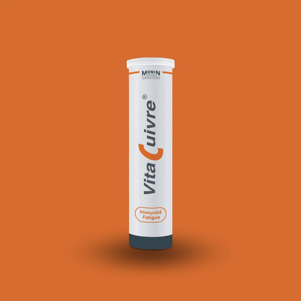 Tube cylindrique avec 'VitaCuivre'. Accents orange. 'Immunité' et 'Fatigue' en dessous. Fond orange.