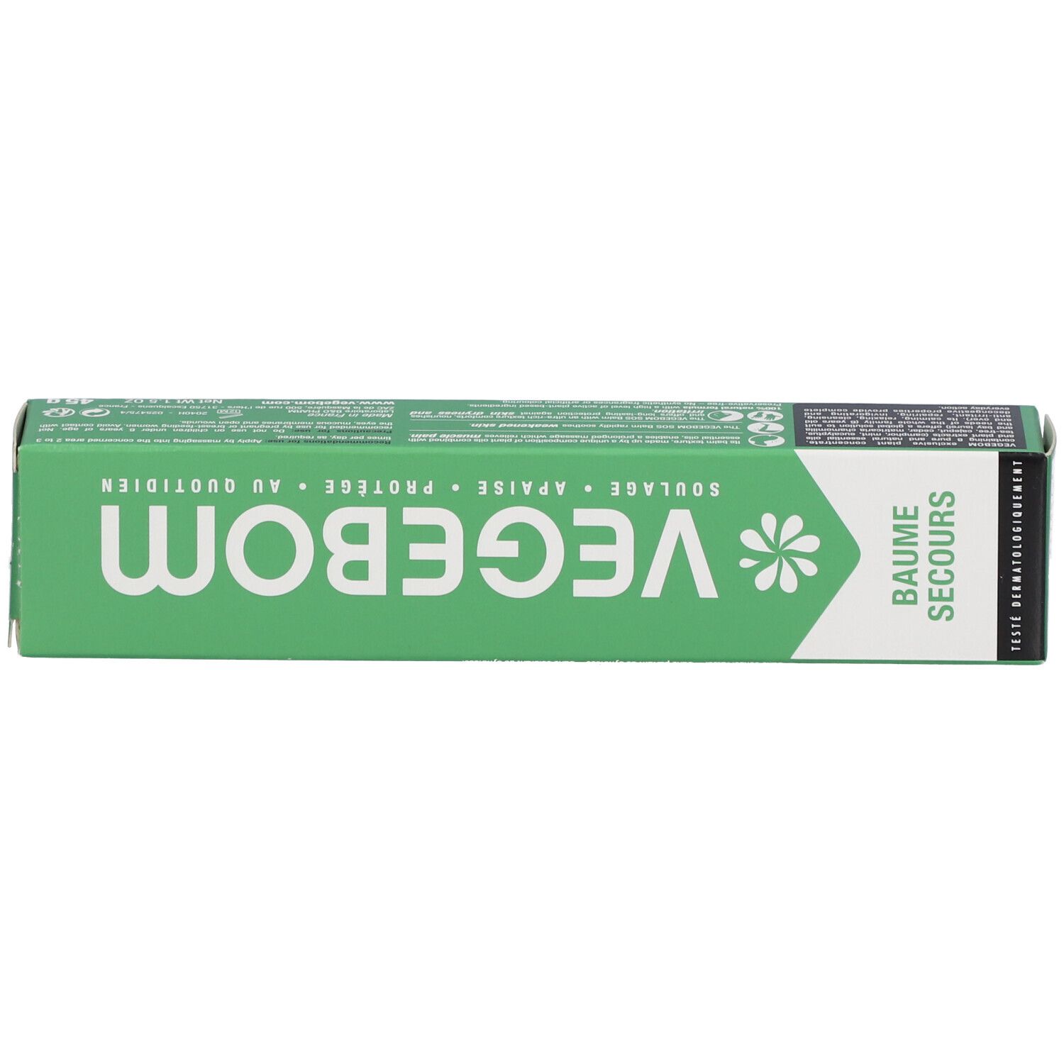 Boîte verte. Inscription: VEGEBOM, BAUME SECOURS. Texte et logo blancs. Testé dermatologiquement.