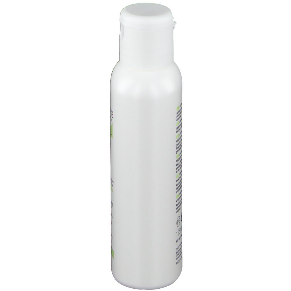 Witte fles met klapdeksel. Opschrift onleesbaar.
