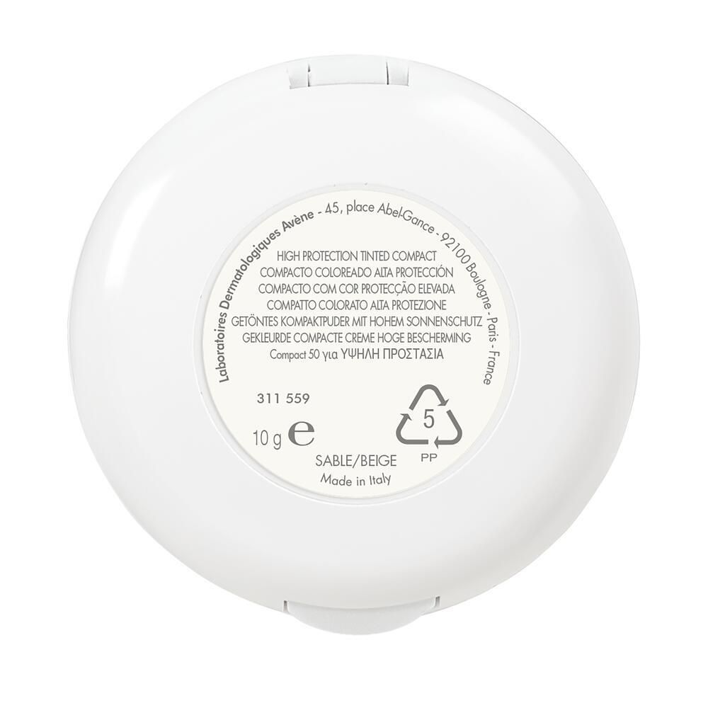 Dos de la poudre compacte blanche. Inscription: HIGH PROTECTION TINTED COMPACT, 10g, Sable/Beige, Made in Italy.