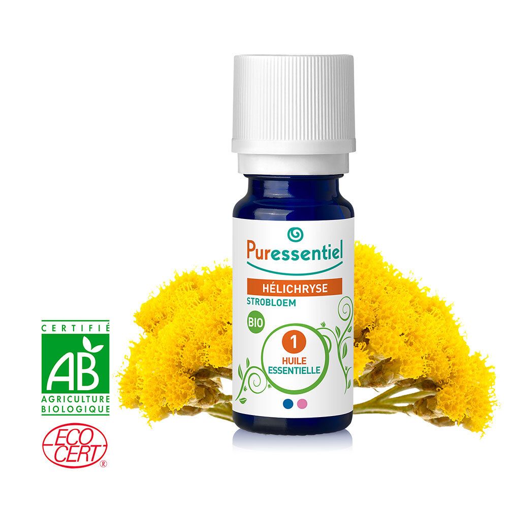 Bruine glazen fles met witte dop en etiket. AB- en Ecocert-certificeringen. Gele bloemen op de achtergrond.