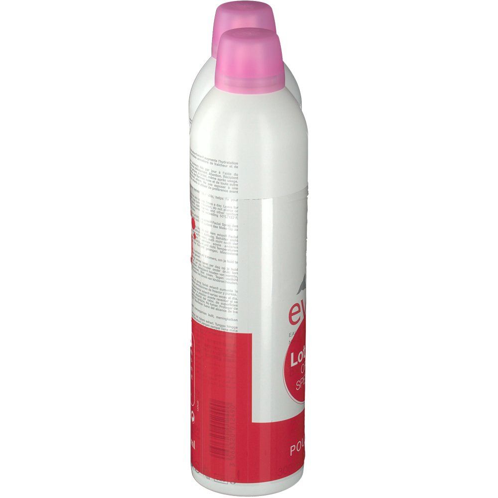 Deux sprays blancs avec bouchons roses, vue latérale. Emballage rouge avec texte. Inscription: evian, Lot de 2.