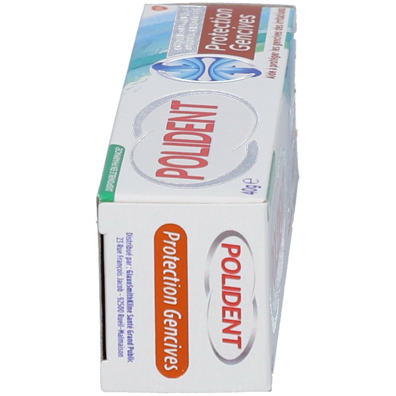 Emballage Polident. Blanc, bleu, orange. Texte: Polident, Protection Gencives, 40g e. Vue de dessus.
