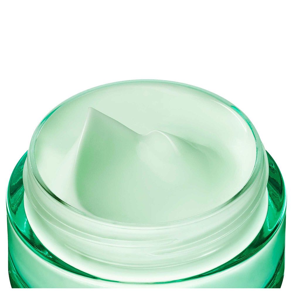 Nahaufnahme des offenen Tiegels. Grünes Gel-Creme sichtbar.