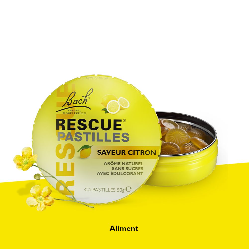 Boîte jaune RESCUE PASTILLES Citron ouverte. Pastilles visibles. Fond jaune avec fleurs.