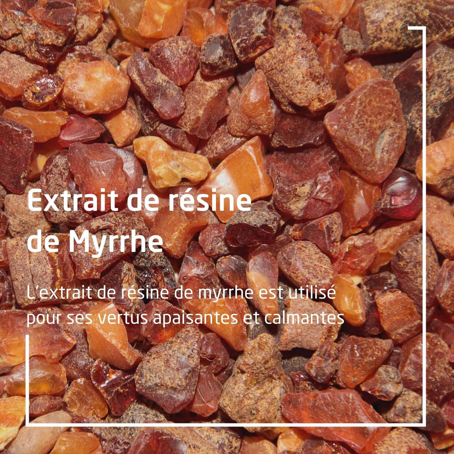 Text: Extrakt de résine de Myrrhe. Text über die beruhigenden Eigenschaften. Hintergrund: Bernstein.