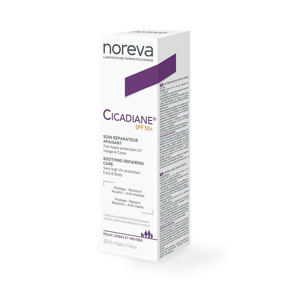 Kartonverpackung mit Produktinformationen. Marke Noreva, Produktname Cicadiane SPF 50+. Text: Soin Réparateur Apaisant.