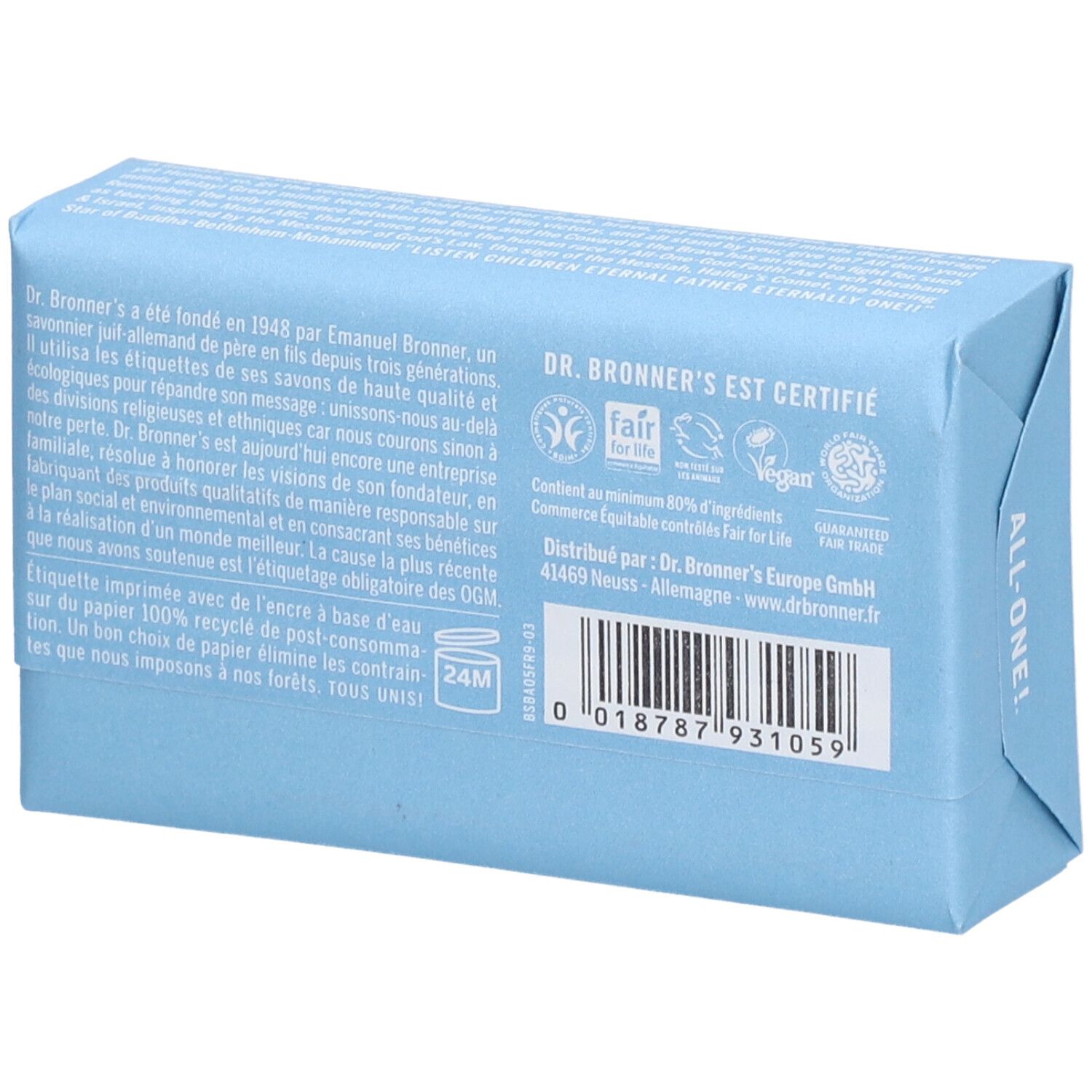 Savon emballé en bleu clair. Inscription : DR. BRONNER'S, ALL-ONE. Verso avec texte et code-barres. Label Fair Trade.
