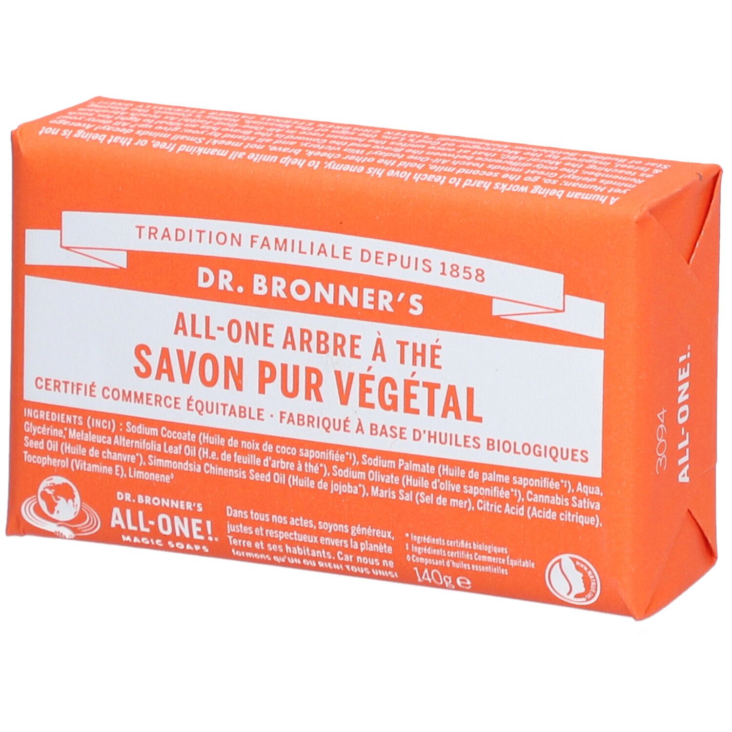 Savon orange emballé. Inscriptions: DR. BRONNER'S, ALL-ONE ARBRE À THÉ SAVON PUR VÉGÉTAL. Commerce équitable.