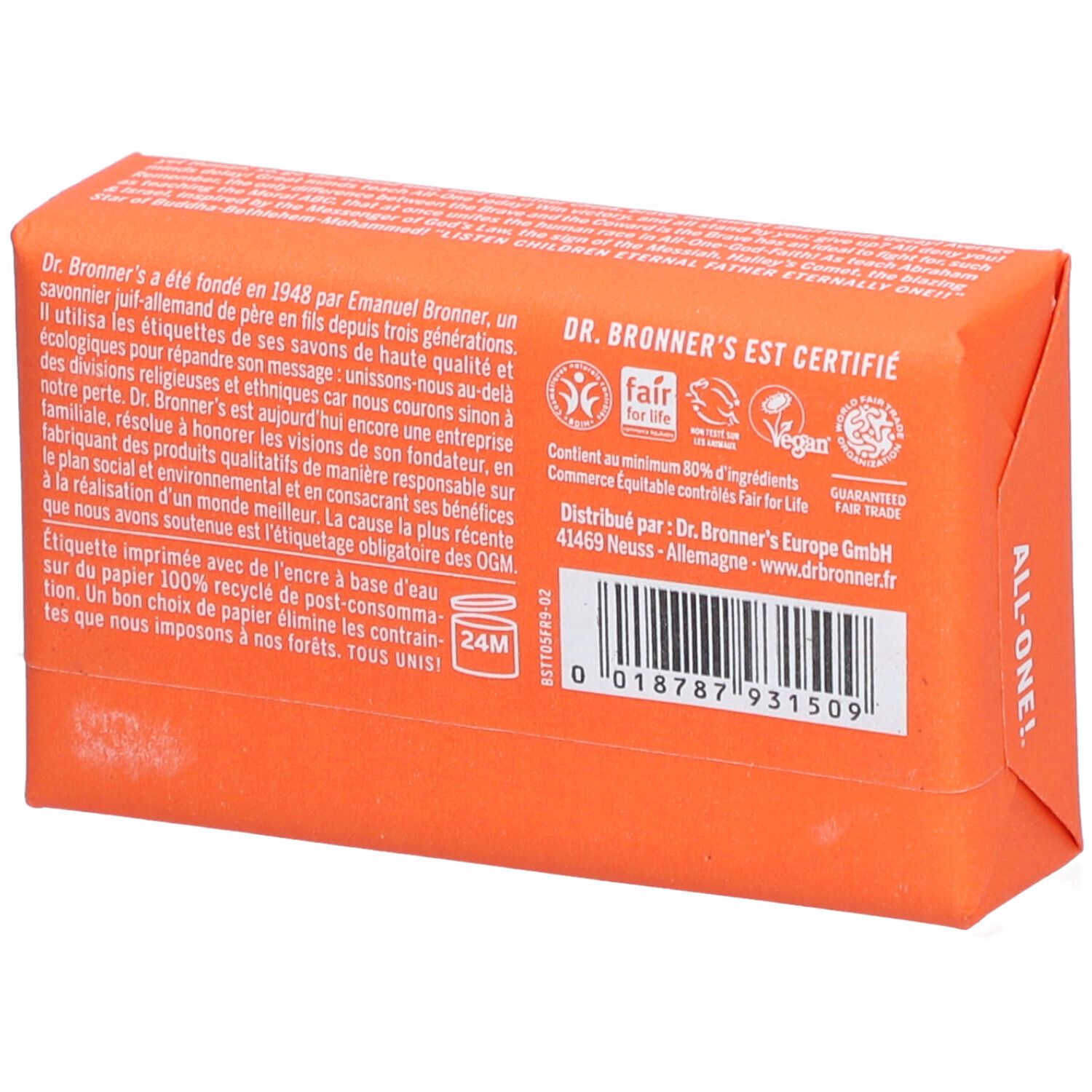 Dos d'un savon orange emballé. Inscriptions: DR. BRONNER'S, Commerce équitable, vegan.