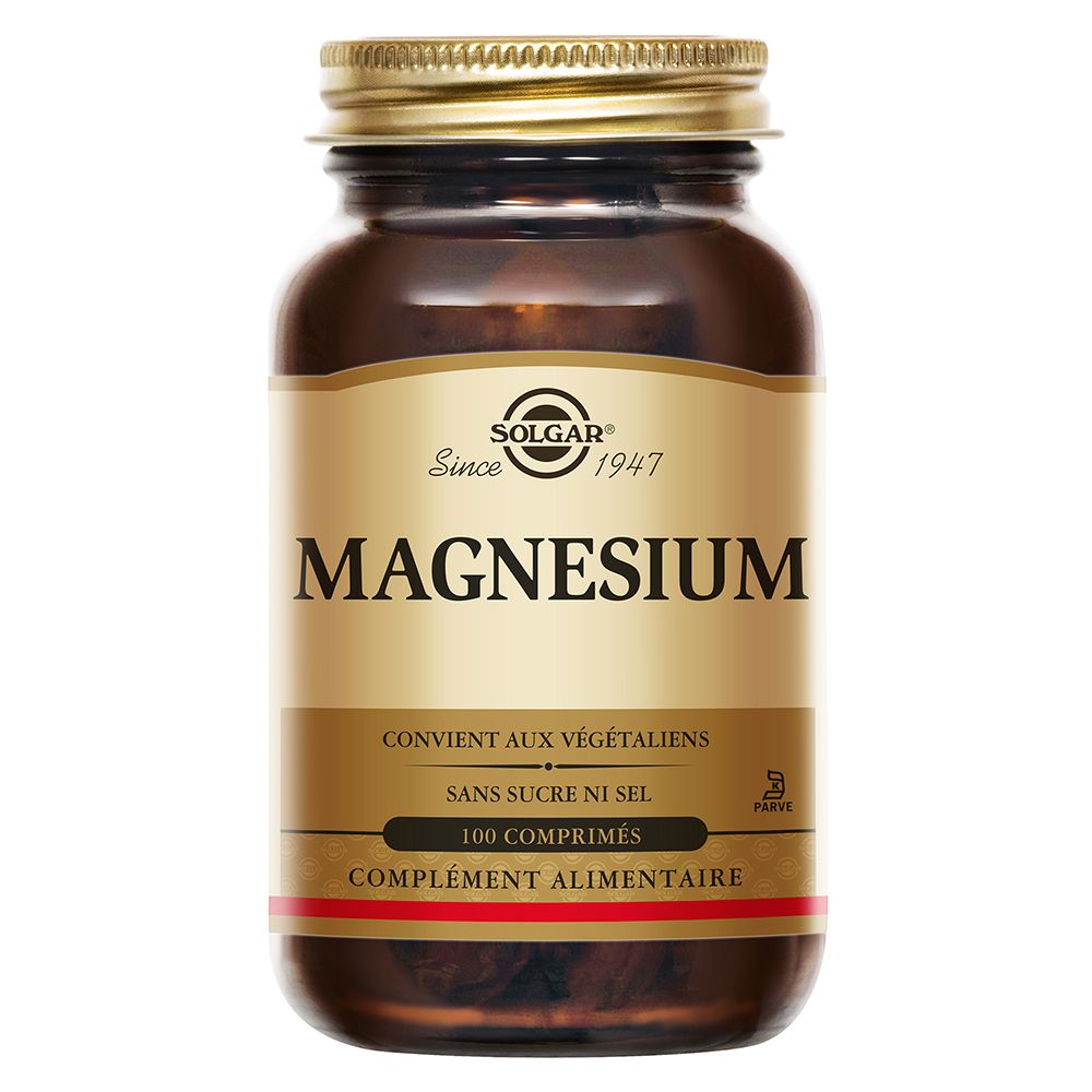 Flacon en verre brun avec couvercle doré. L'étiquette indique "SOLGAR Magnesium". Contient 100 comprimés.