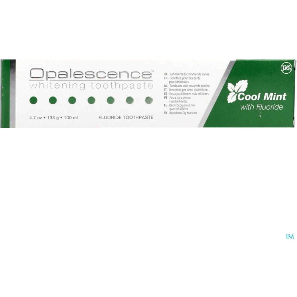 Emballage de dentifrice, blanc et vert. Inscription : Opalescence, Cool Mint, Fluorure. Boîte verte et blanche.