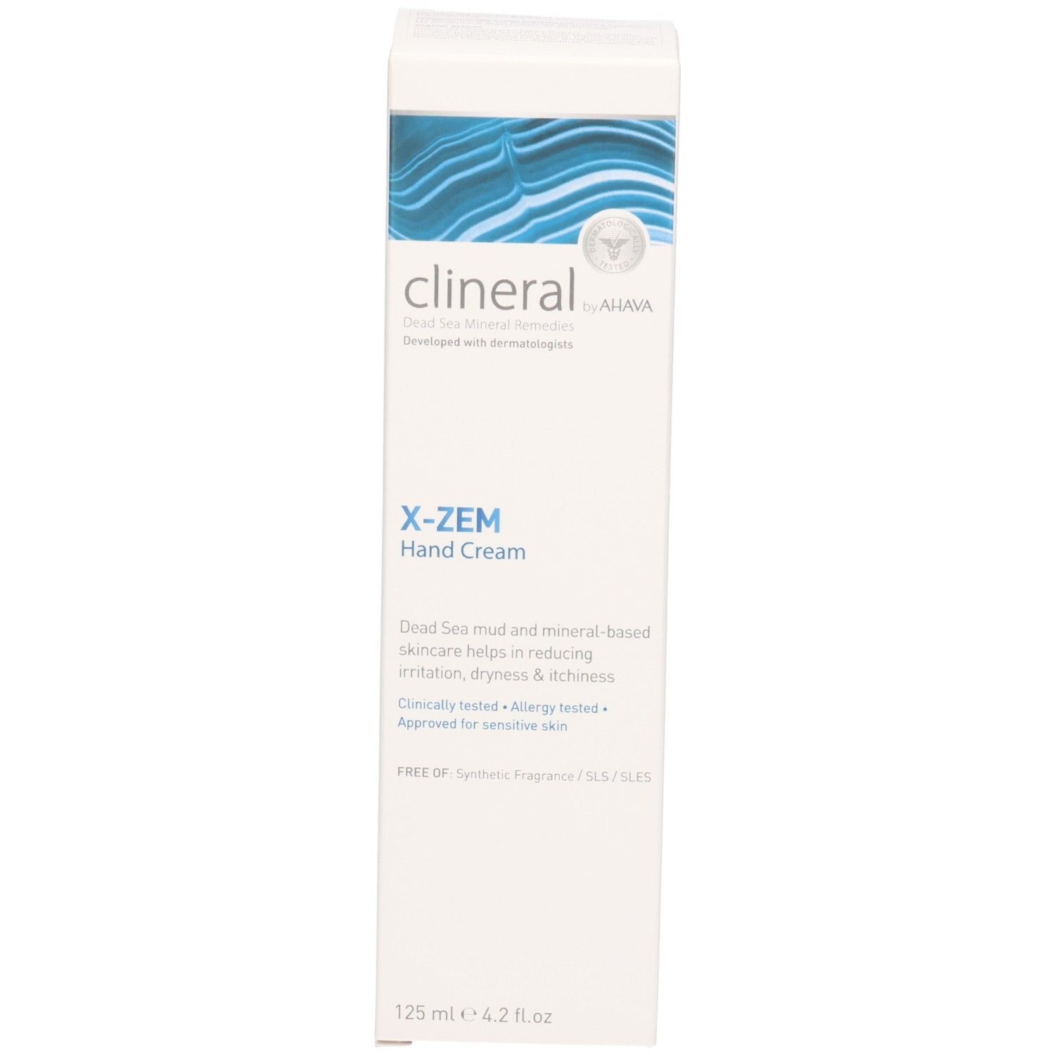 Clineral X-ZEM Handcreme Verpackung. Weiß, blaue Wellen. Text: X-ZEM Hand Cream, Dead Sea Mineral Remedies.