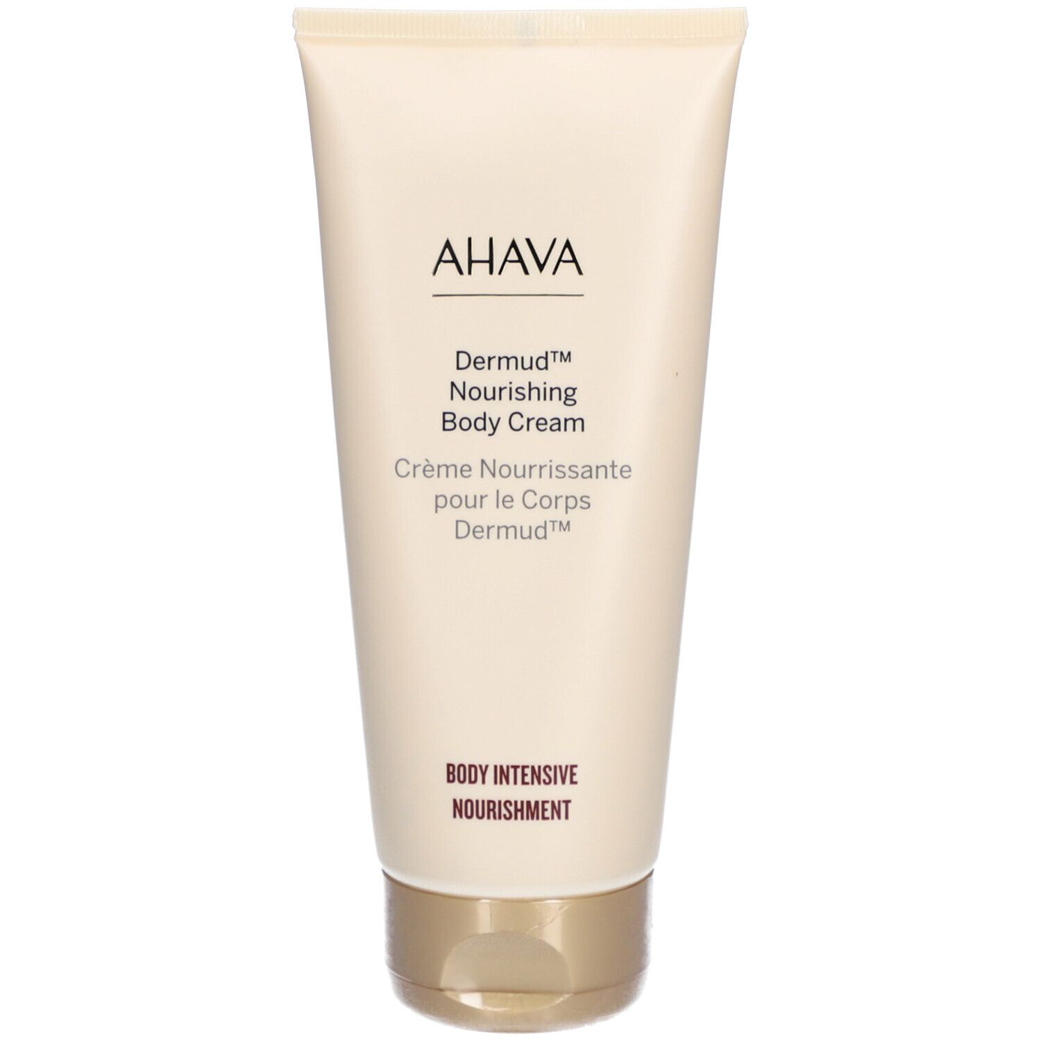 Tube beige avec bouchon doré. Inscription AHAVA, Dermud™ Nourishing Body Cream. Texte : Body Intensive Nourishment.