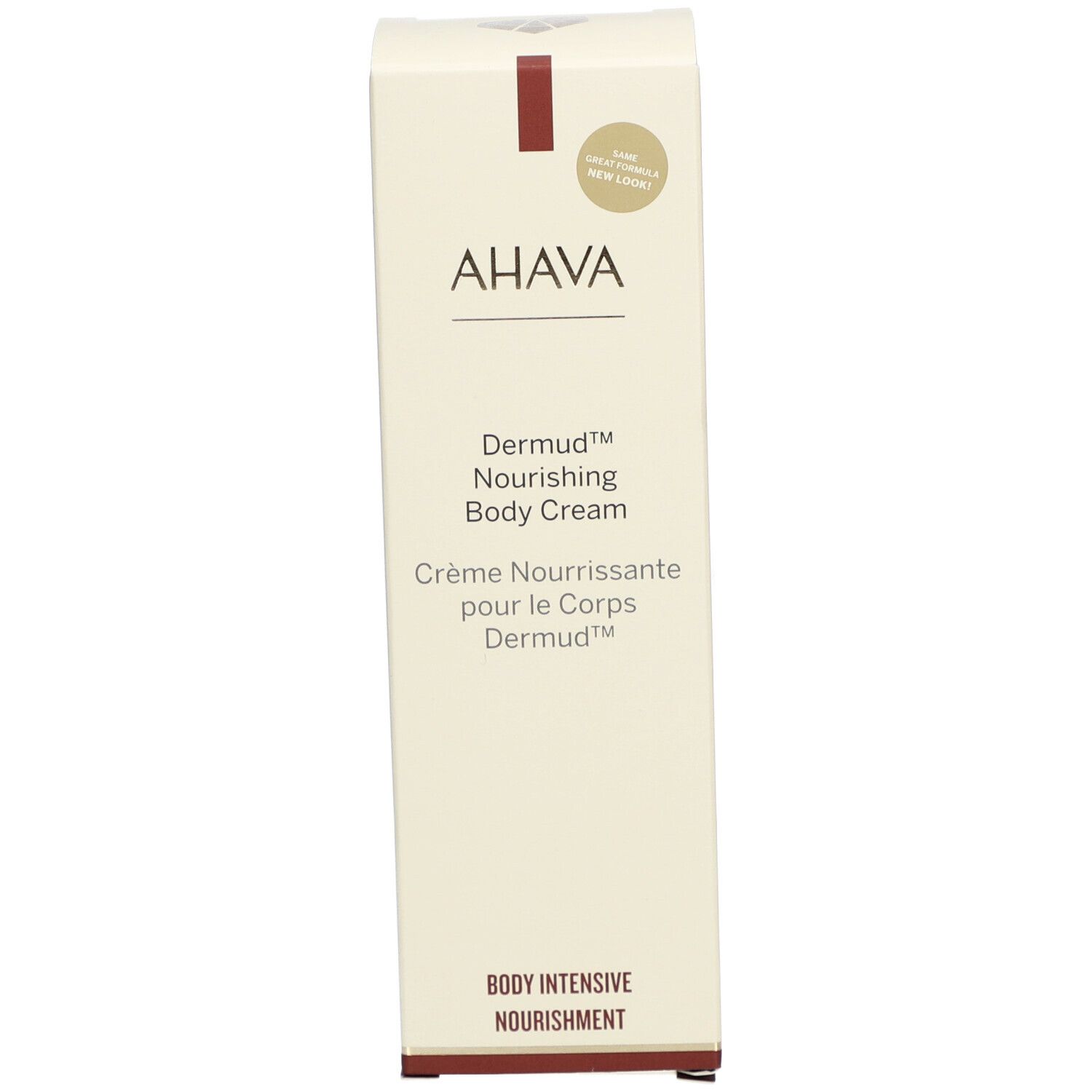 Boîte haute et rectangulaire. Inscription AHAVA, Dermud™ Nourishing Body Cream. Texte : Body Intensive Nourishment. Bande rouge.