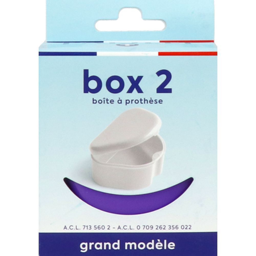 Boîte blanche Box 2, grand modèle, ouverte, dans emballage. Inscriptions : "box 2", "boîte à prothèse", "grand modèle".