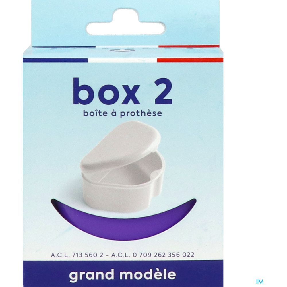 Boîte blanche Box 2, grand modèle, ouverte, dans emballage. Inscriptions : "box 2", "boîte à prothèse", "grand modèle".