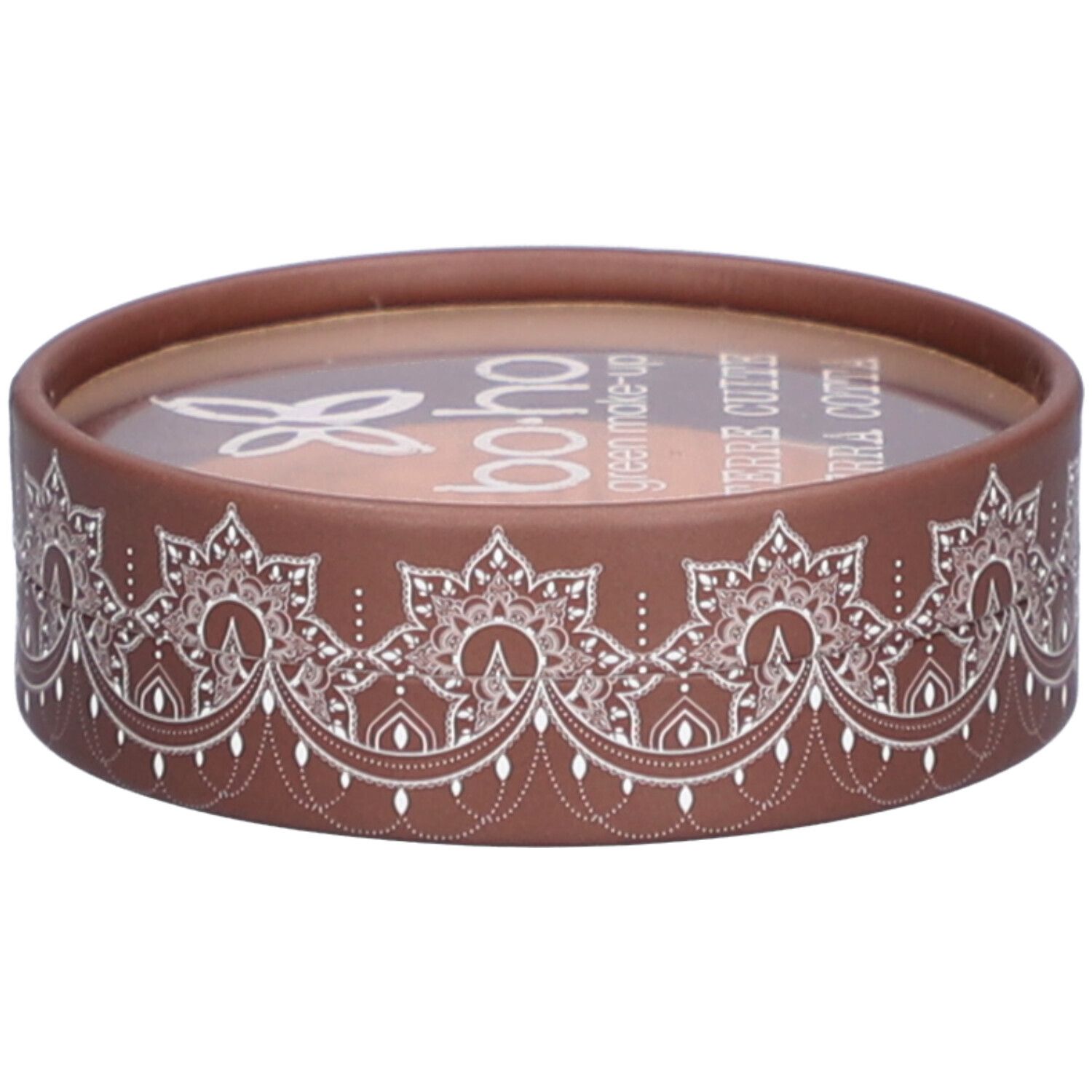 Emballage rond marron avec motif blanc. Couvercle transparent. Inscription: BOHO, Terre Cuite.