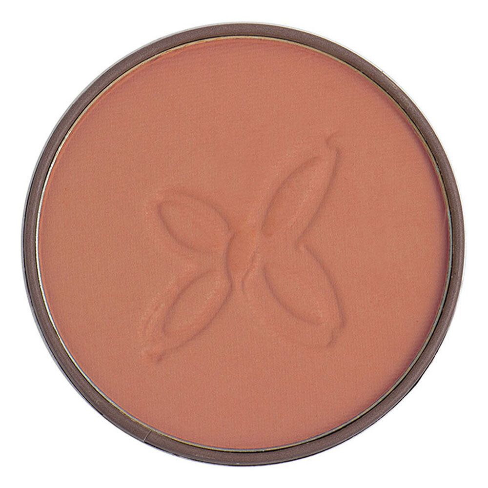 Wangenschminke in runder Dose. Rosa Farbton mit geprägtem Muster. Brauner Rand.
