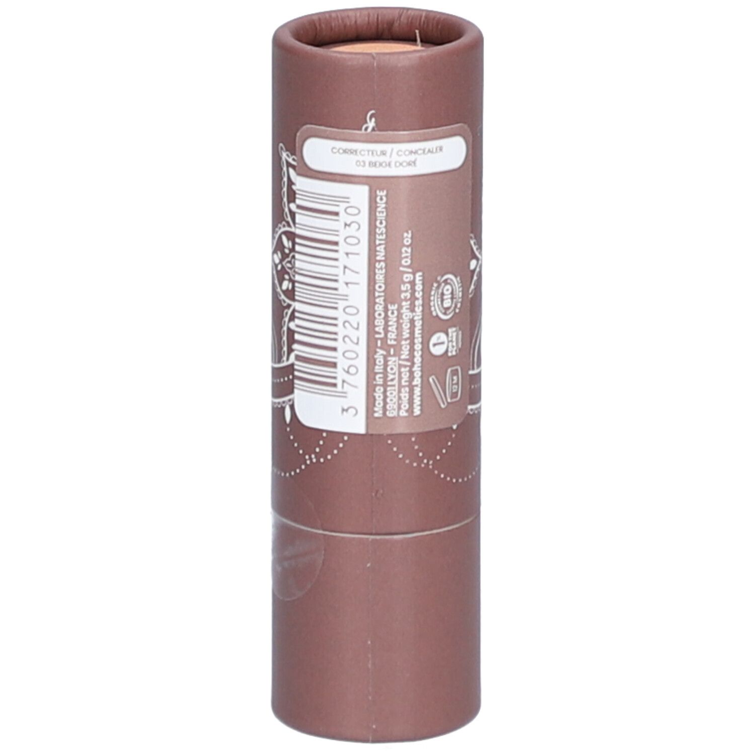 Emballage cylindrique avec code-barres et texte. "Correcteur / Concealer" en haut.