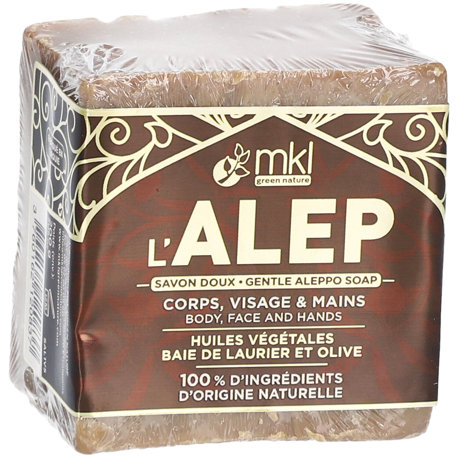 Vierkante zeep verpakt in folie. Label: mkl green nature, L'ALEP, Savon doux, Corps, Visage & Mains, Huiles végétales, 100% d'ingrédients.