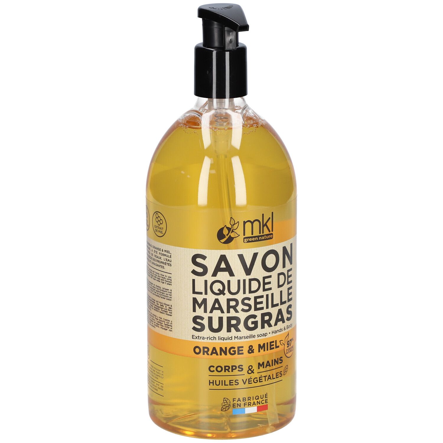 Flüssigseife in einer Flasche mit schwarzem Pumpverschluss. Aufschrift: SAVON LIQUIDE DE MARSEILLE SURGRAS, Orange & Honig.