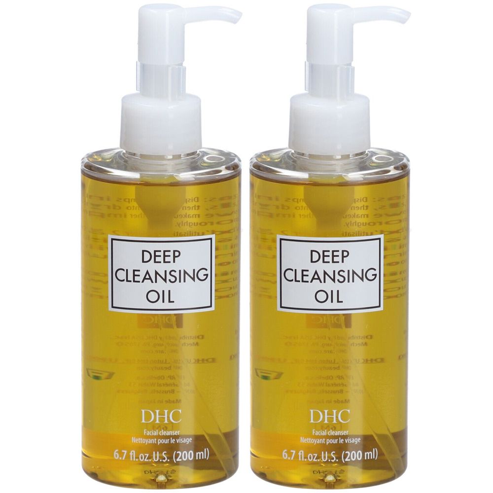 Deux flacons avec « Deep Cleansing Oil » et pompe. Marque DHC. Liquide jaune visible.