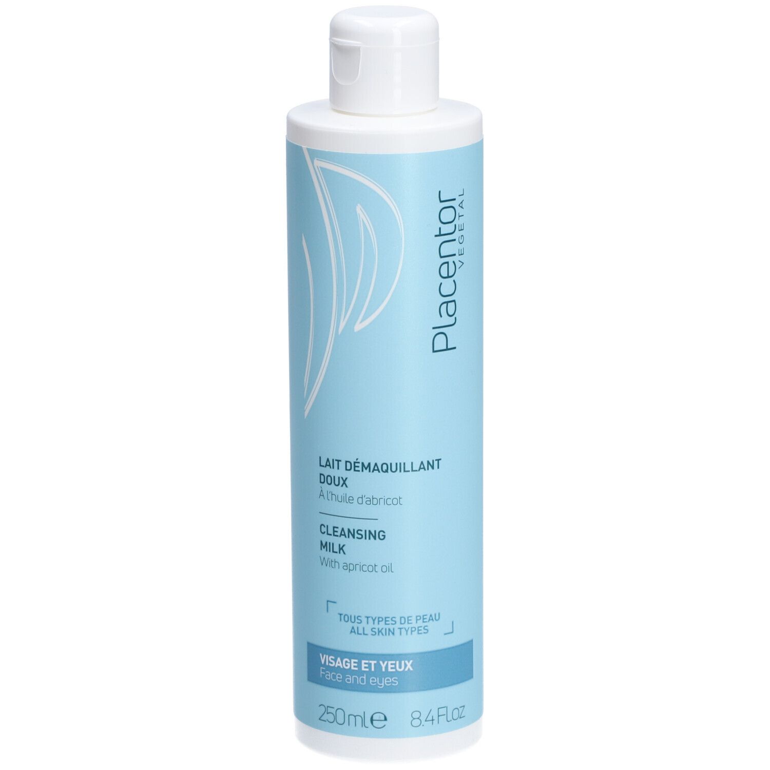 Flacon de lait démaquillant bleu clair, bouchon blanc. Texte: Lait démaquillant doux, Cleansing Milk, Tous types de peau, Visage et yeux.