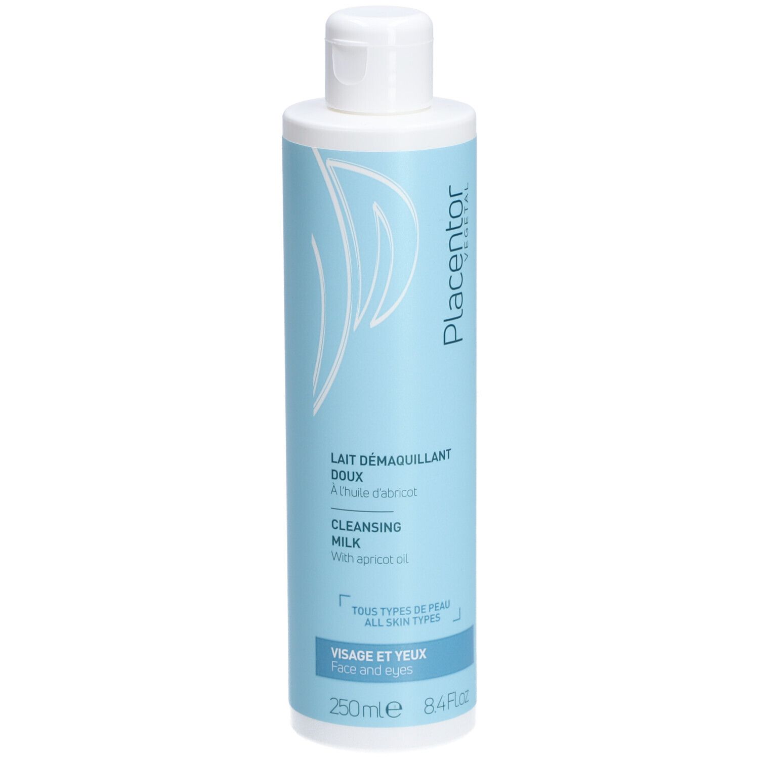 Flacon de lait démaquillant bleu clair, bouchon blanc. Texte: Lait démaquillant doux, Cleansing Milk, Tous types de peau, Visage et yeux.
