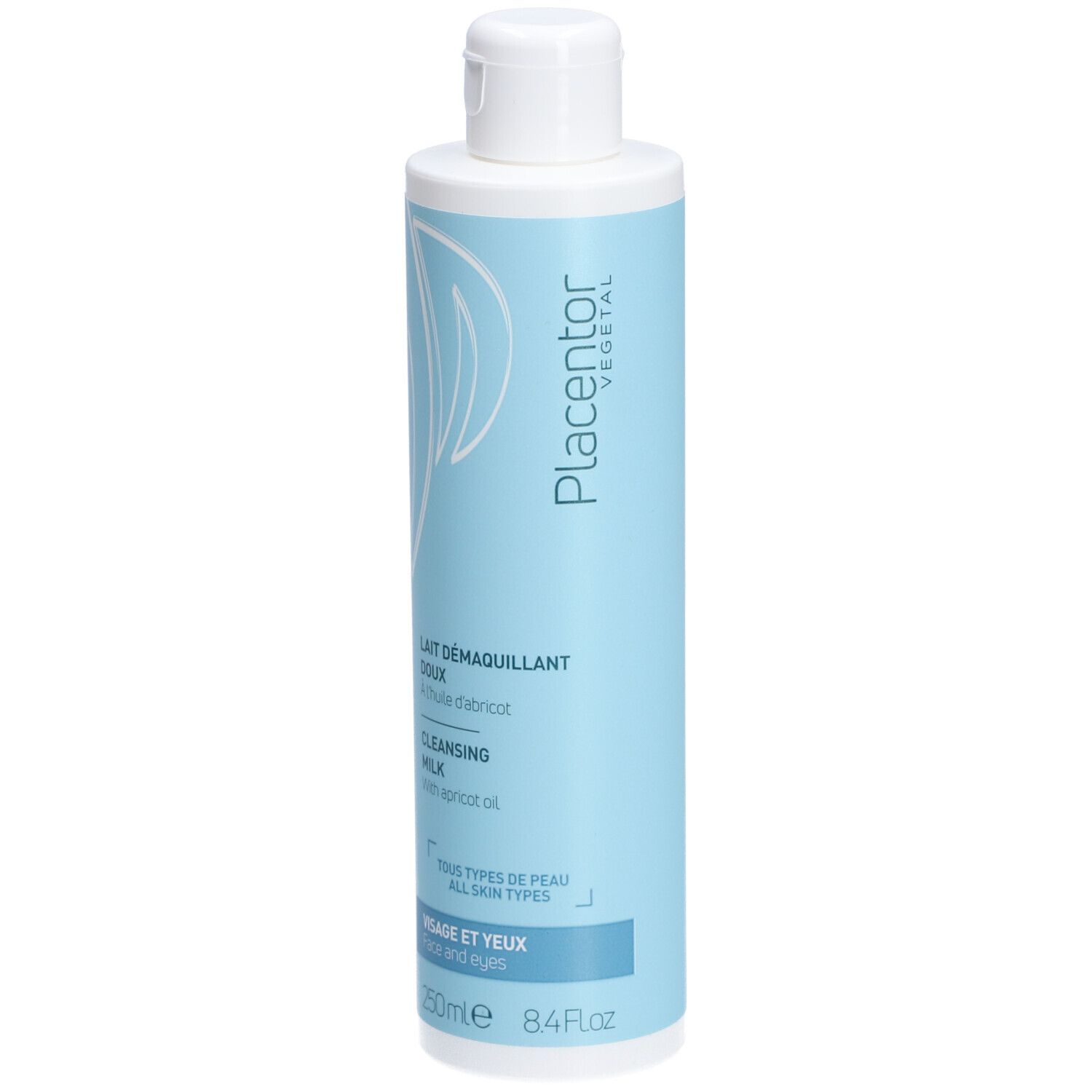 Flacon de lait démaquillant bleu clair, bouchon blanc. Texte: Lait démaquillant doux, Cleansing Milk, Tous types de peau, Visage et yeux.