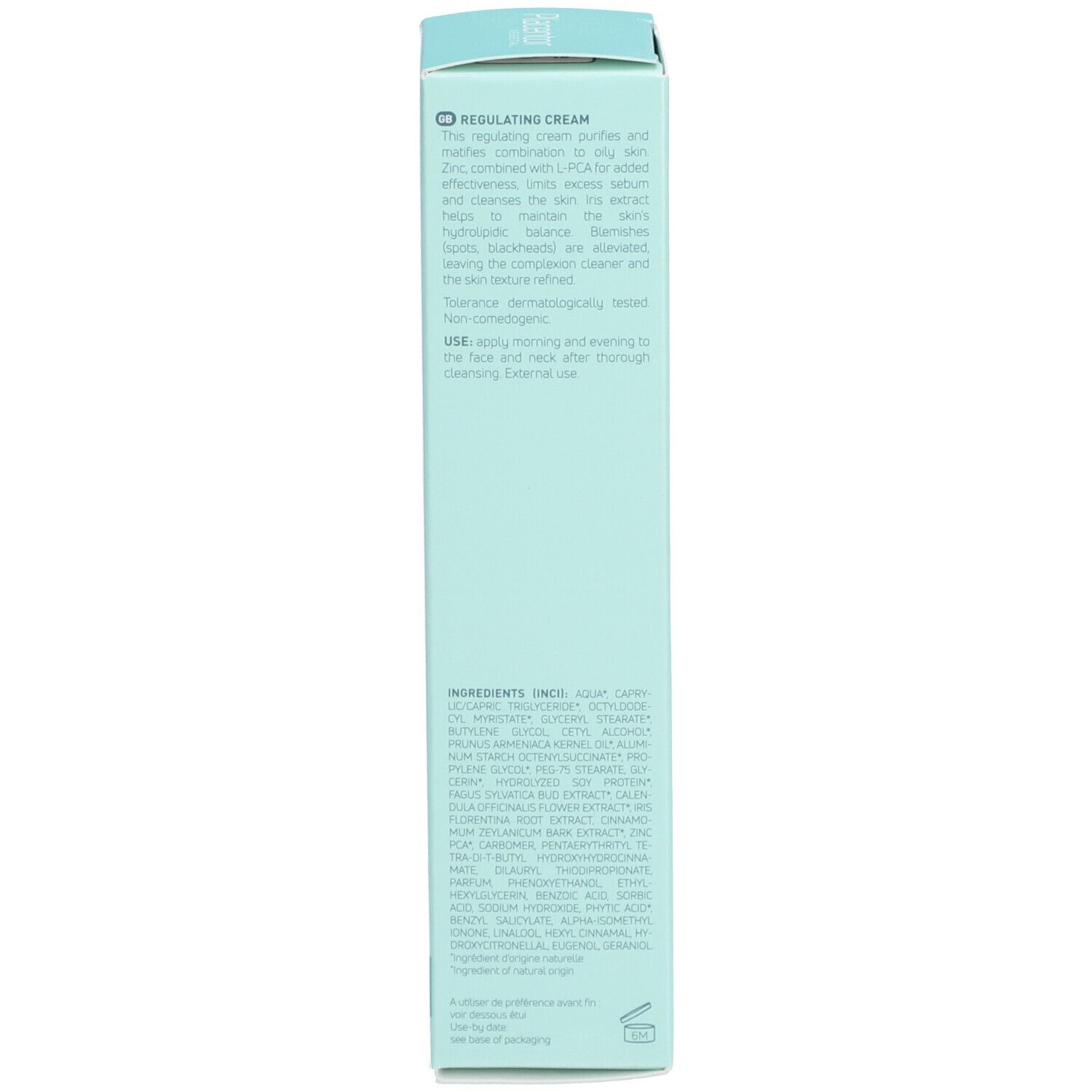Dos de la boîte bleu clair. Texte: Regulating Cream. Ingrédients et conseils d'utilisation. Fabriqué en France.