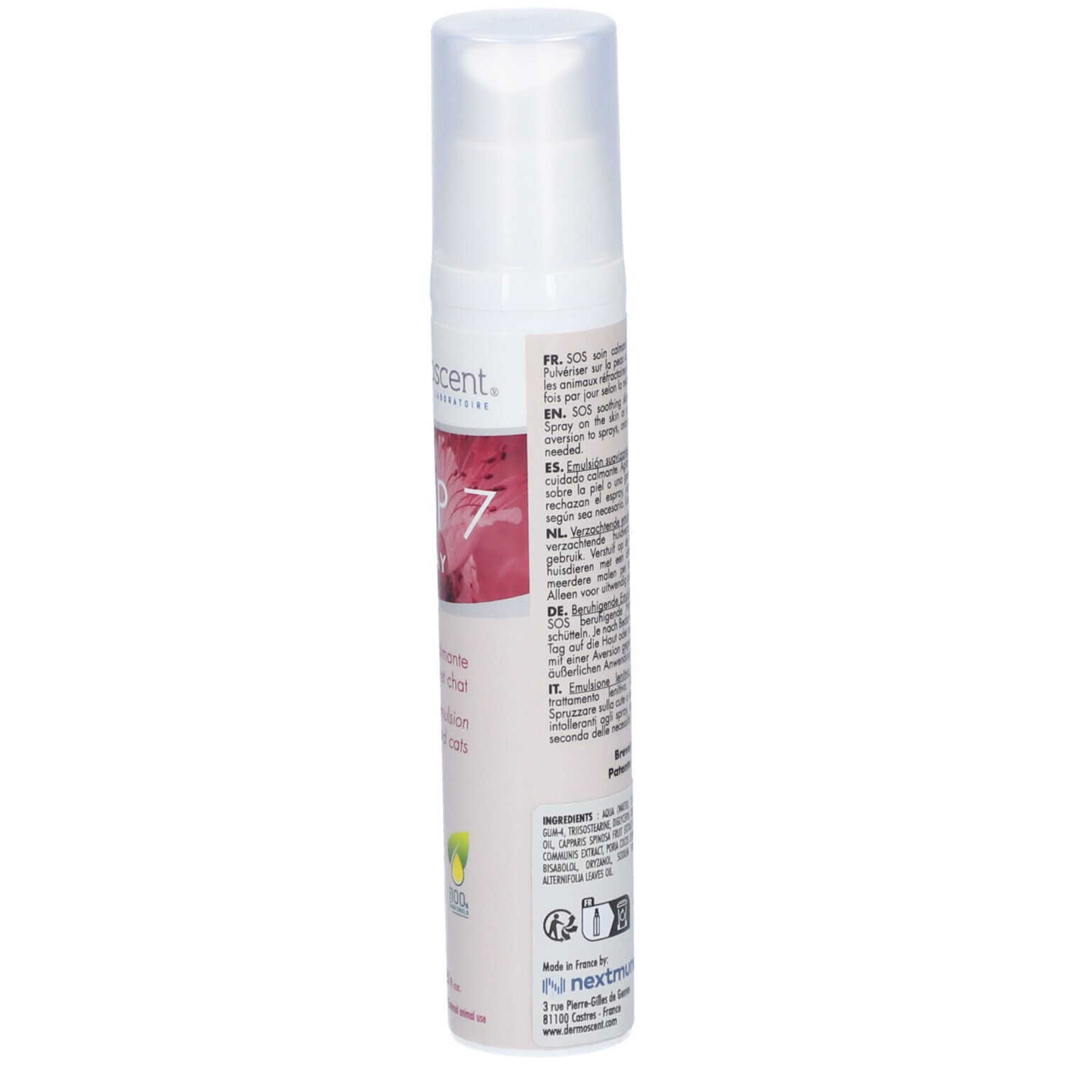 Witte spray met roze etiket. Tekst in het Frans, Engels, Duits, Nederlands. Bevat gebruiksinformatie.