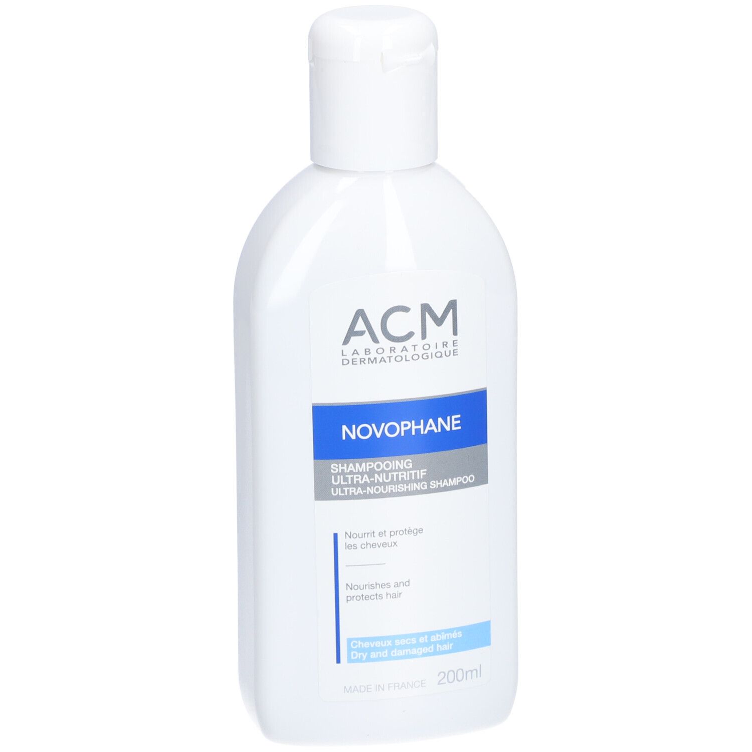 Weiße Flasche mit blauem Etikett. Aufschrift: ACM Novophane Shampooing Ultra-nutritif. Für trockenes, geschädigtes Haar.