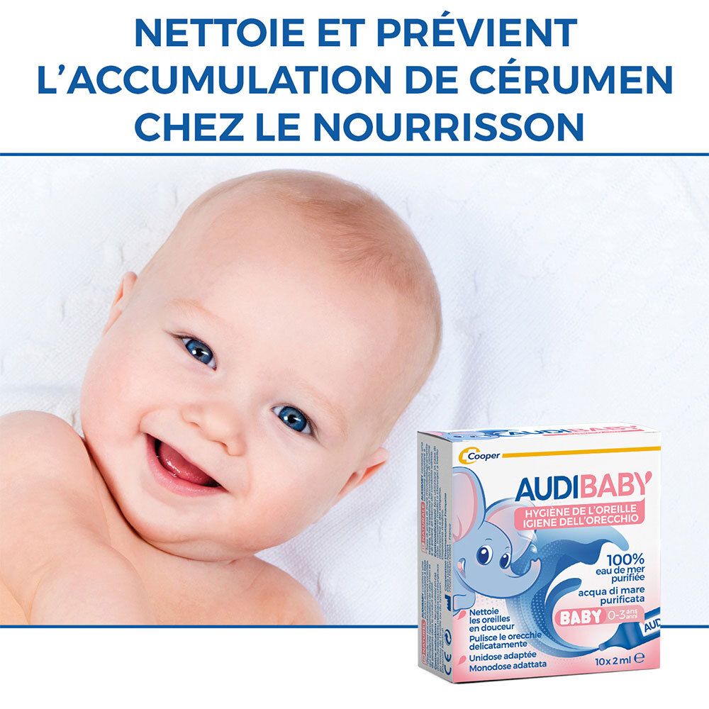 Bébé souriant. Texte : Nettoie et prévient l'accumulation de cérumen chez le nourrisson. À côté de la boîte AUDIBABY.