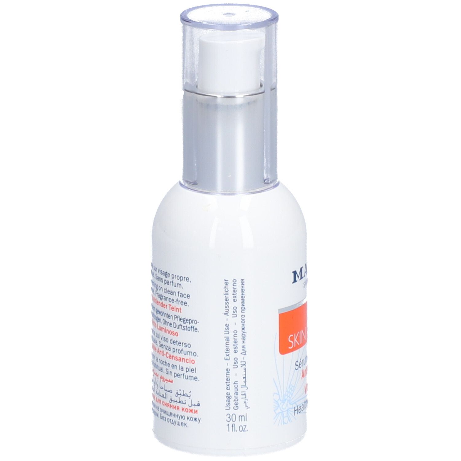 Flacon blanc avec pompe argentée. Inscription : MAVALA SKIN VITALITY. Contient Sérum Bonne Mine Anti-Fatigue. 30 ml.