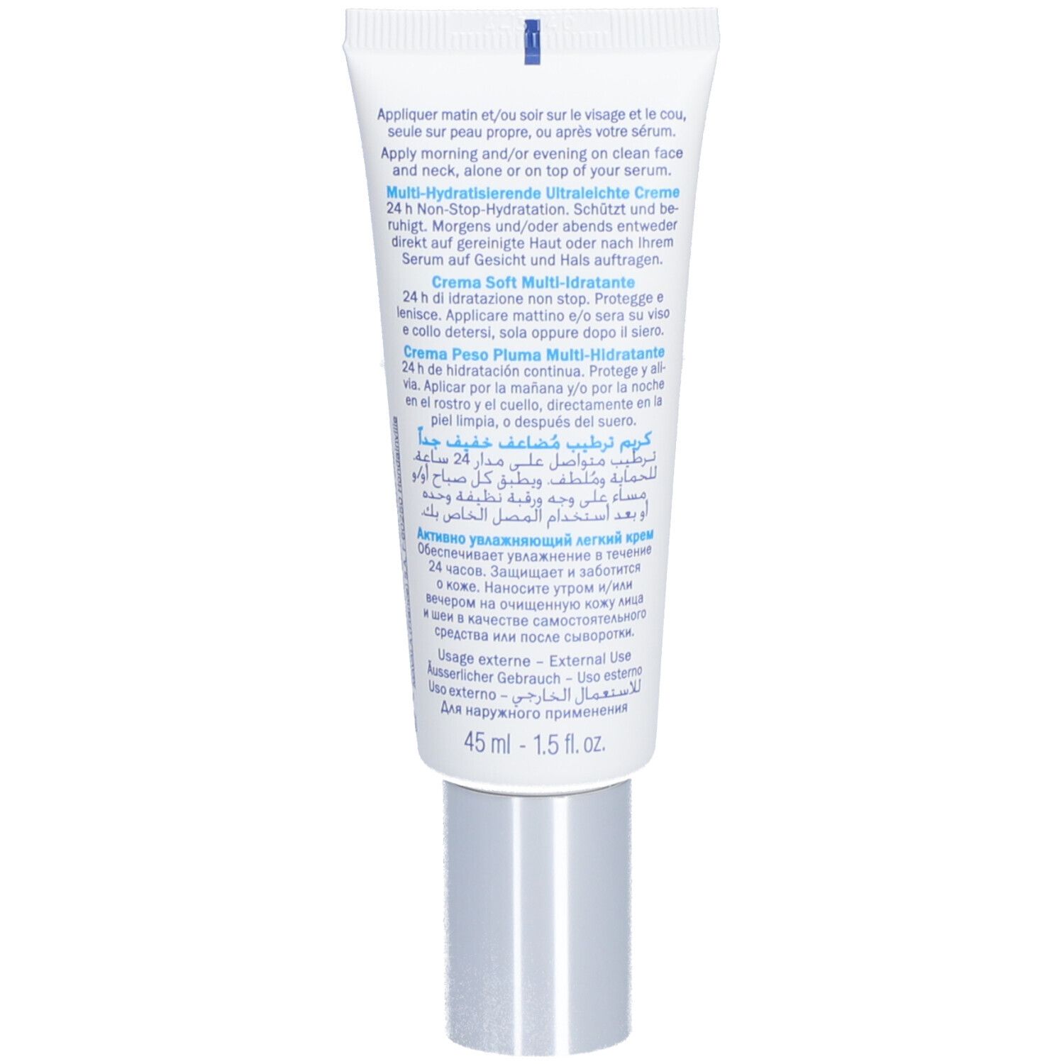 Rückseite der Creme-Tube AQUA PLUS. Mehrsprachiger Text, silberfarbene Kappe.