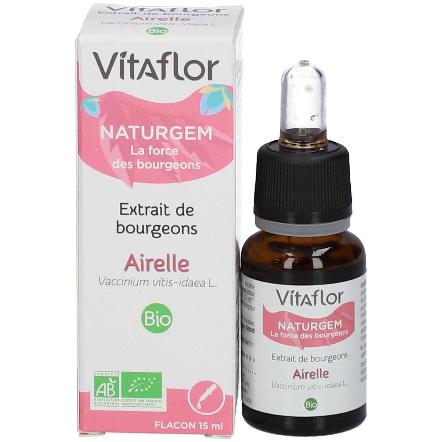 Flacon et emballage. Boîte blanche avec nom du produit, ingrédients et label Bio. Flacon avec pipette.