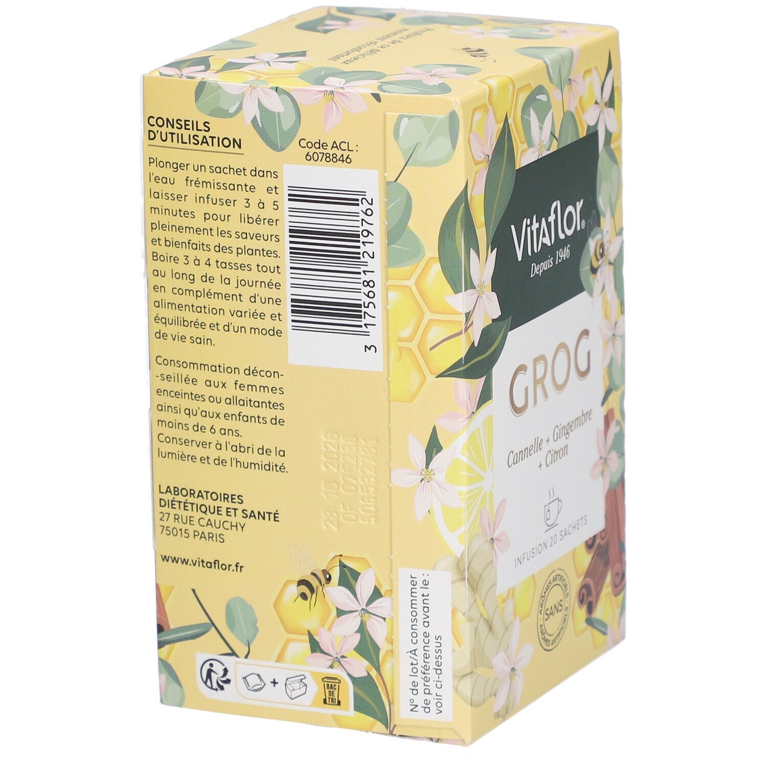 Gele doos Vitaflor Grog. Opschrift: Kaneel, Gember, Citroen. 20 zakjes. Zonder kunstmatige aroma's. Achterkant met tekst.