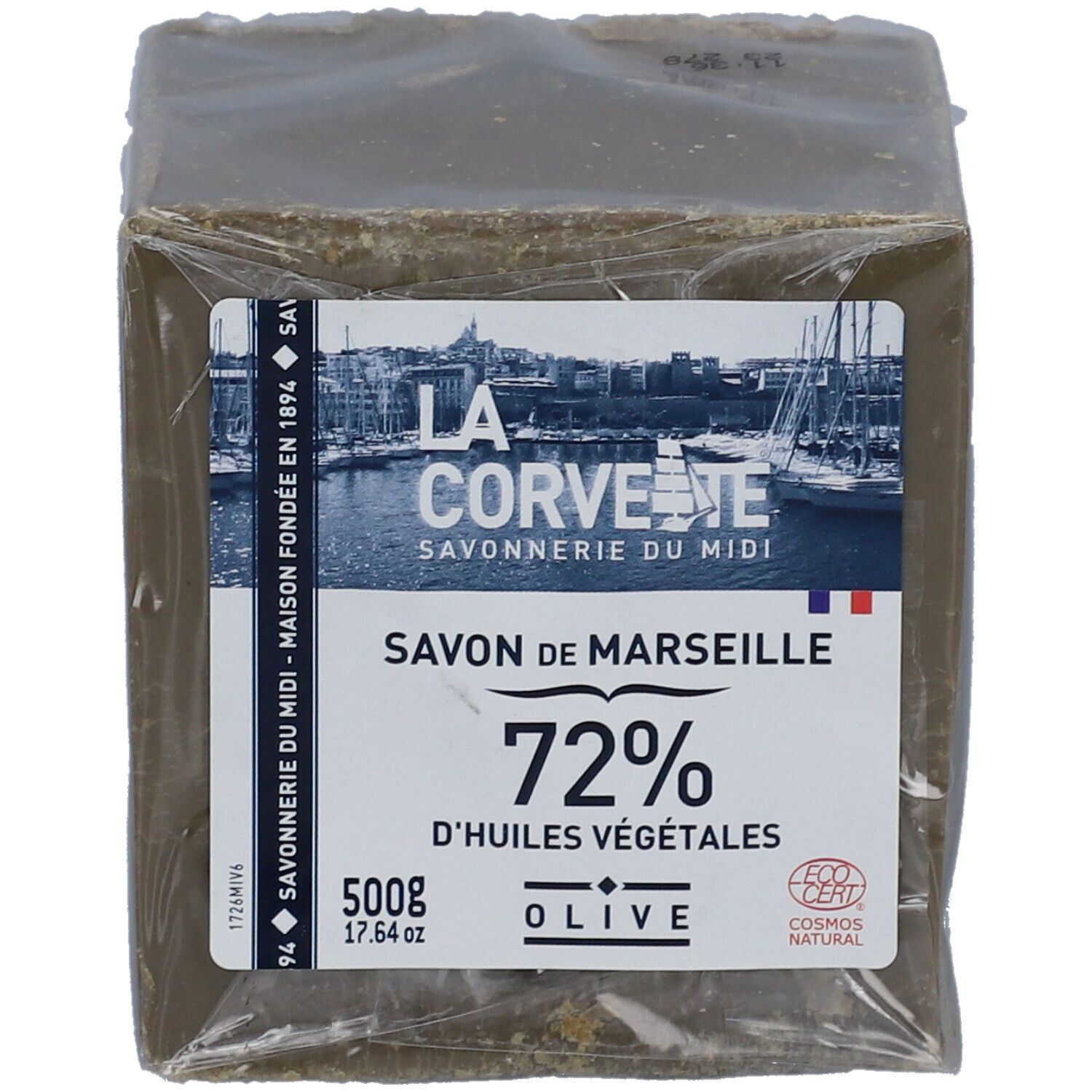 Quadratischer Seifenwürfel in Folie verpackt. Aufkleber mit Text: LA CORVETTE, Savon de Marseille, 72% d'huiles végétales, Olive.