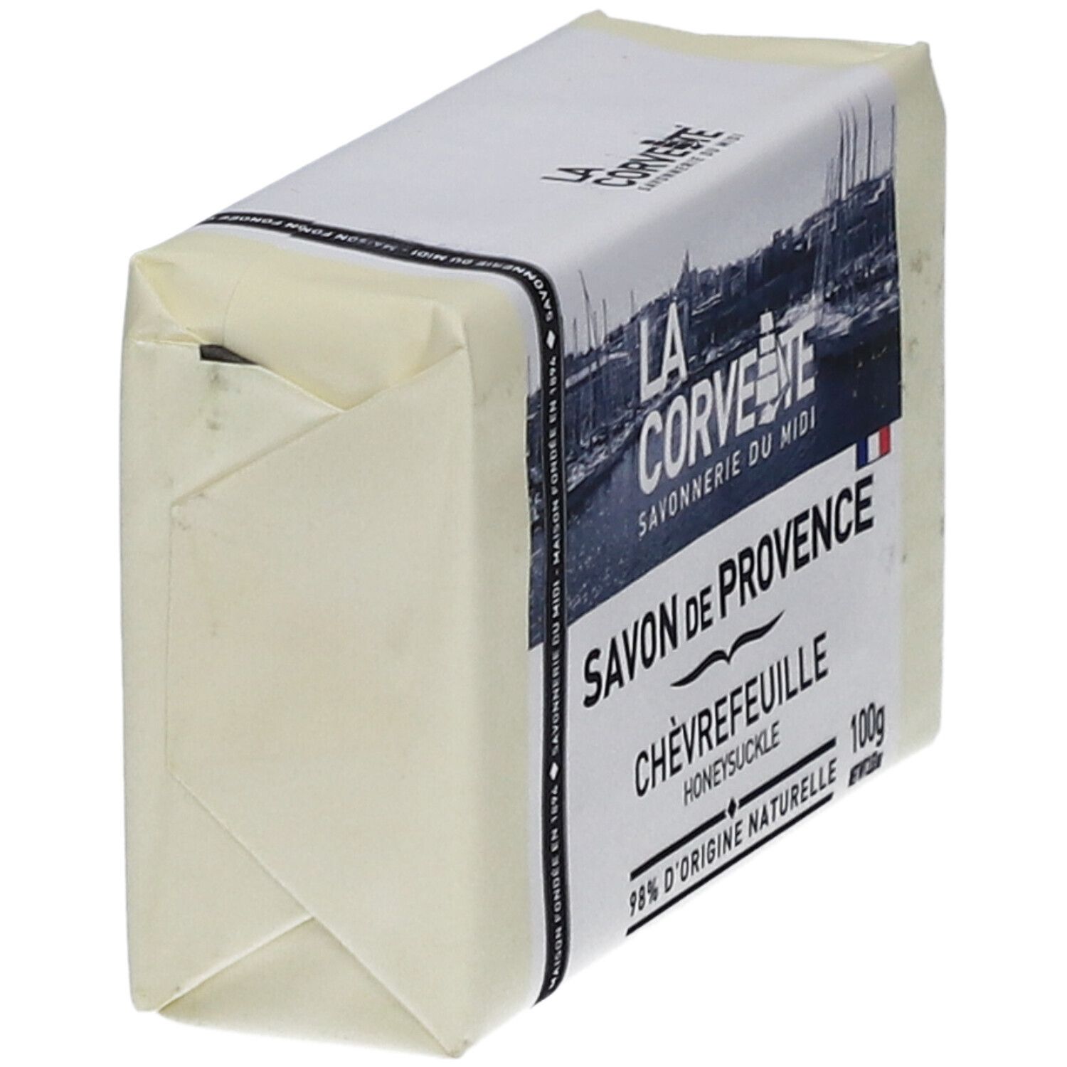 Seifenstück in Papier verpackt. Aufschrift: Savon de Provence Chèvrefeuille. Markenname und Logo sichtbar.