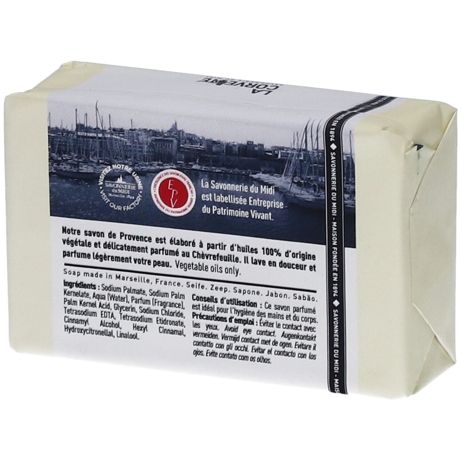 Verpacktes Seifenstück. Rückseite mit Text und Logo. Text: Savon de Provence, Chèvrefeuille. Zertifizierung.