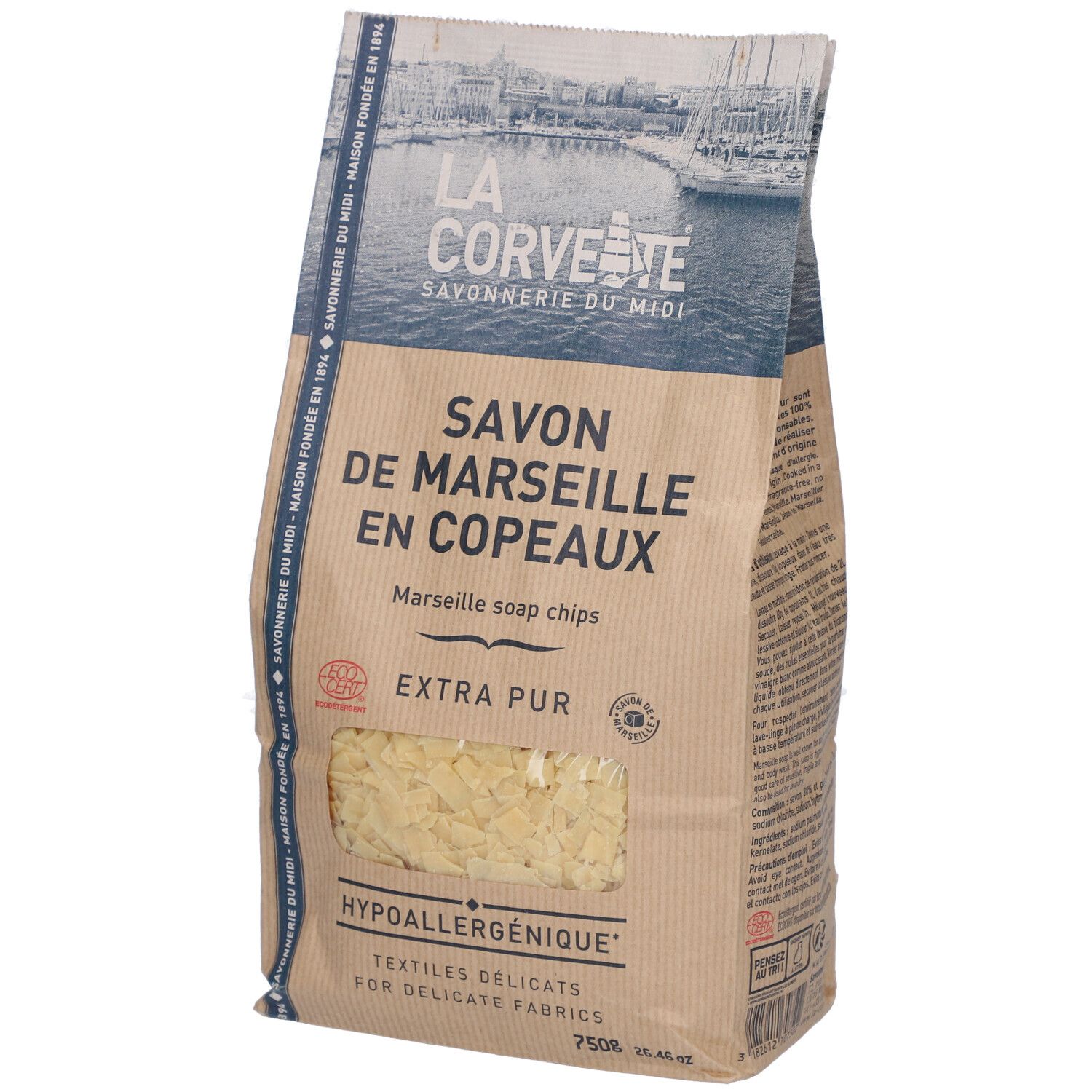 Sac de savon de Marseille en copeaux. Fenêtre montrant des copeaux. Texte: Extra Pur, hypoallergénique.