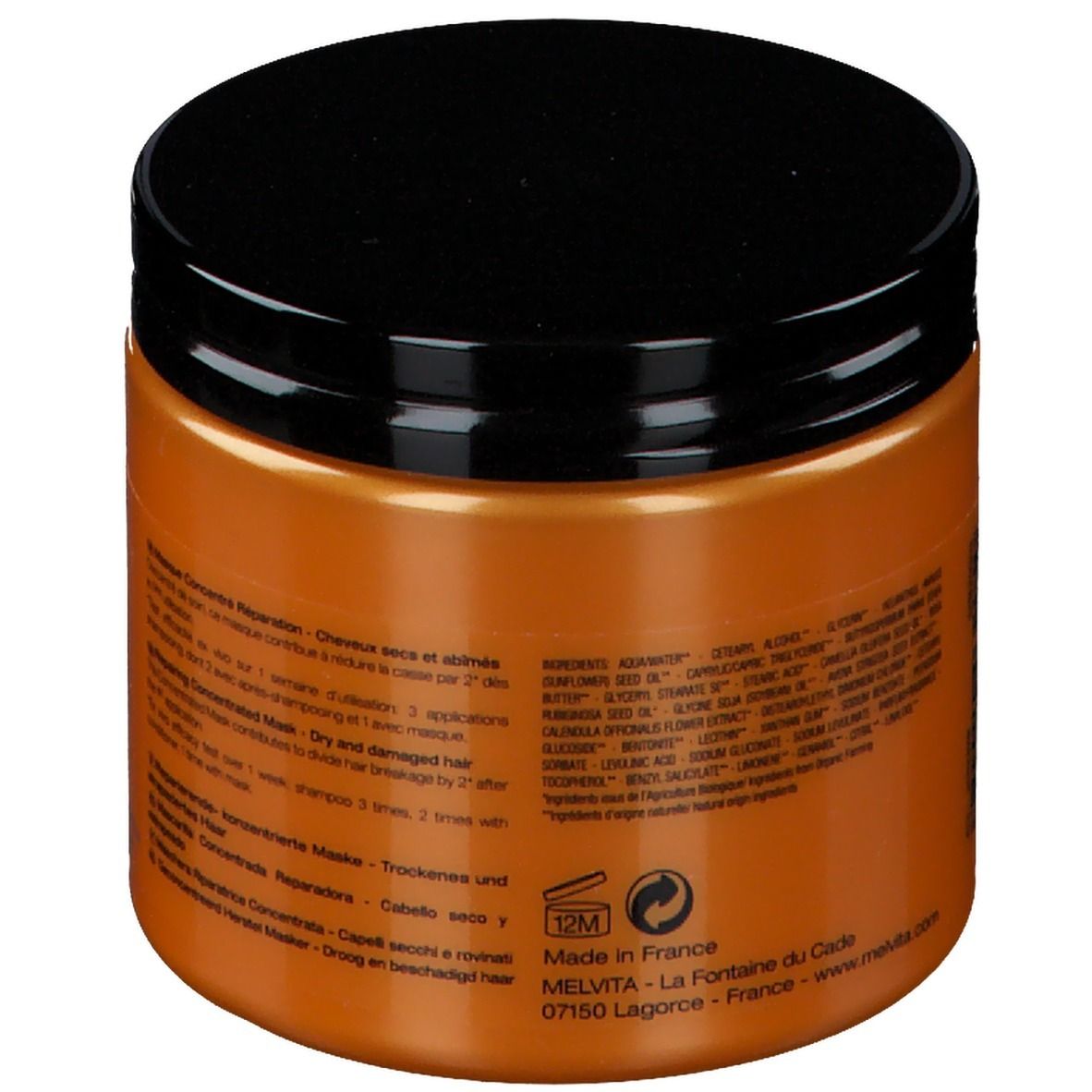 Pot orange avec couvercle noir. Dos avec texte multilingue. Liste des ingrédients et informations fabricant.