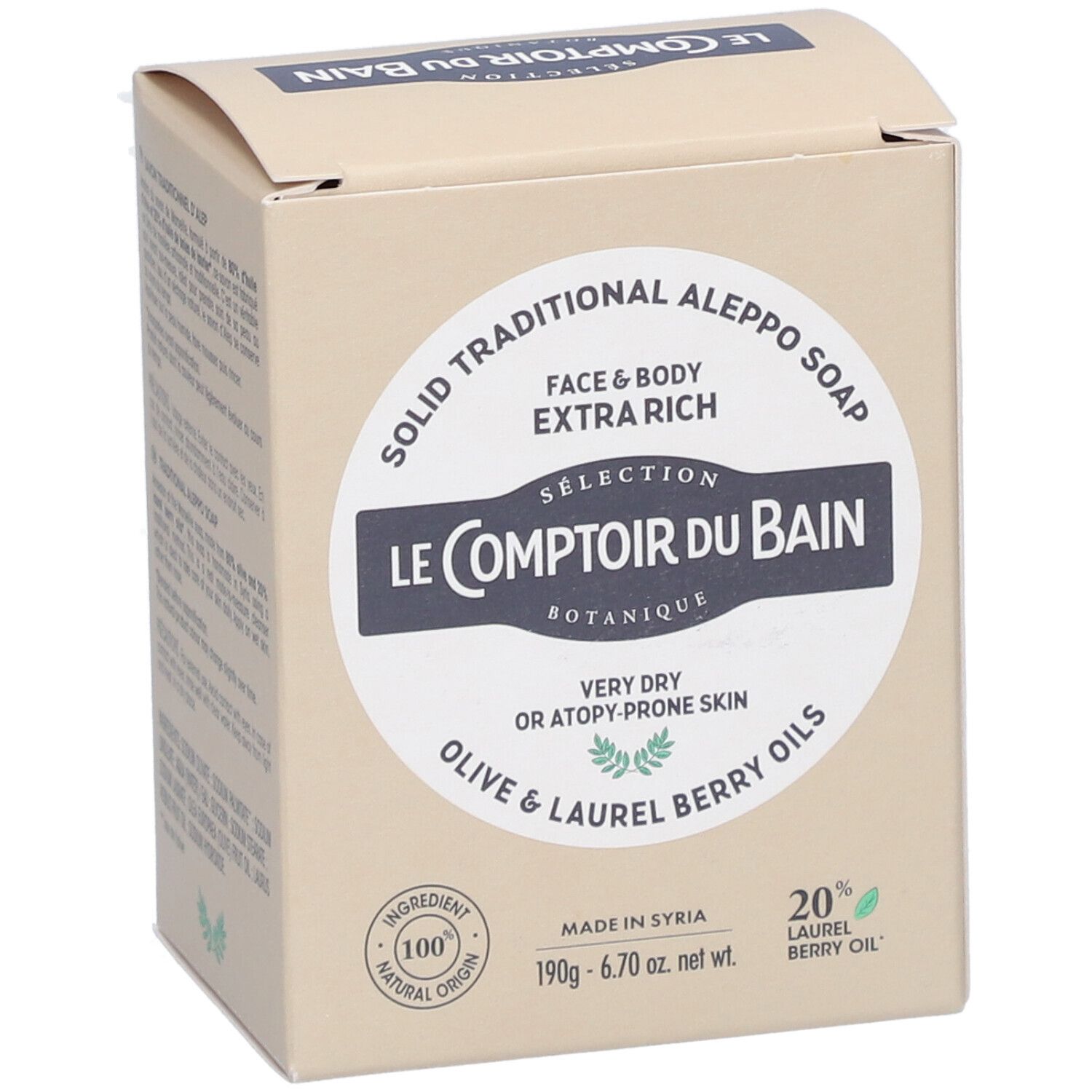 Karton mit Aufdruck. Text: Le Comptoir du Bain, Aleppo Seife, für Gesicht & Körper, sehr trockene Haut. 100% natürliche Inhaltsstoffe.