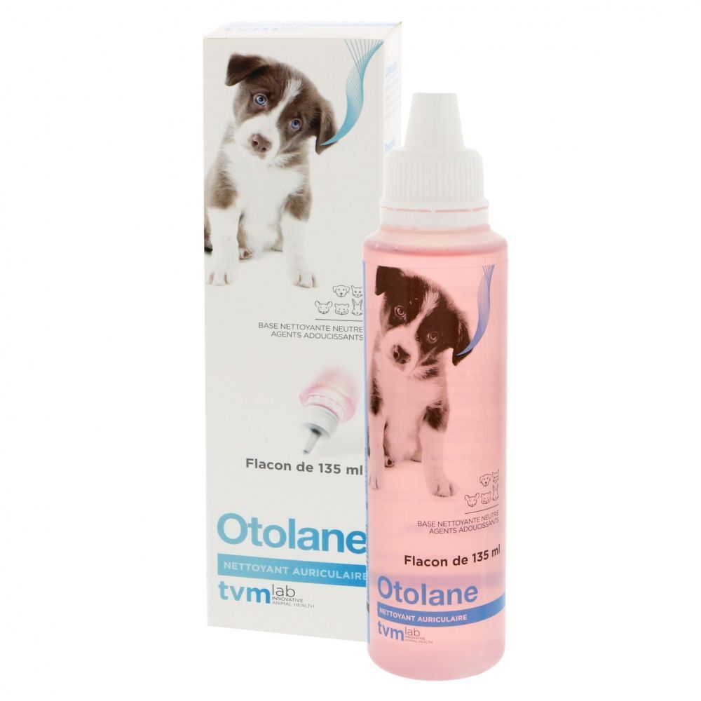 Flacon Otolane et emballage. Liquide rose, image de chiot. Flacon avec applicateur. 135 ml.